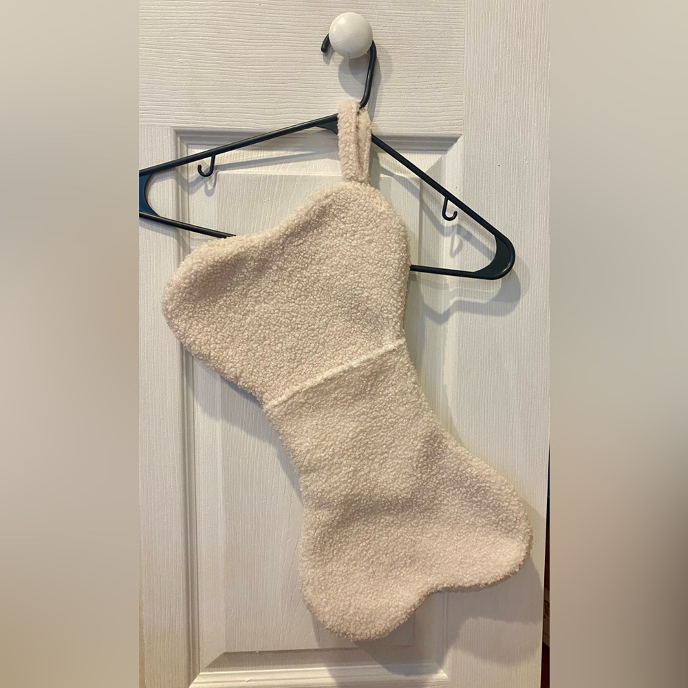 Dog bone Christmas stocking in white/off-white
